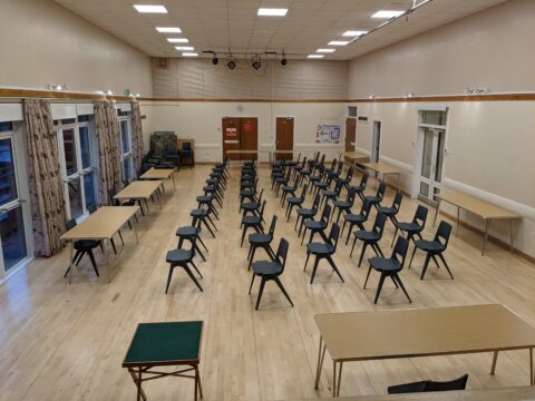 Tables and chairs in the village Hall