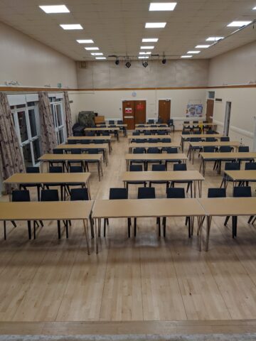 Tables and chairs in the village Hall